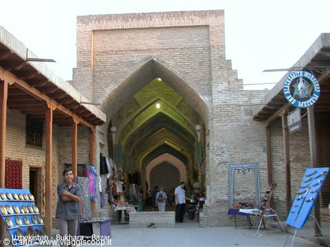 Covered bazaar in Bukhara: brick vaulted arches with souvenir stalls