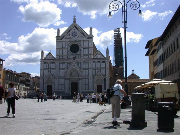 Tourists on the square in front of Santa Croce facade, Florence