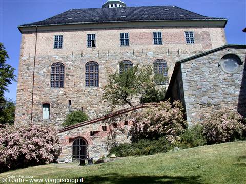 Akershus Fortress in Oslo, stone and brick walls under the sun
