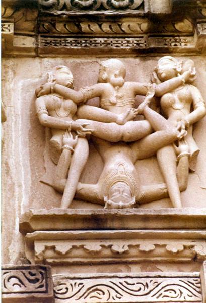 Sandstone erotic sculpture carved on the Khajuraho temple