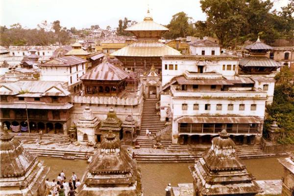 Pashupatinath temple: pagoda roofs, stone stairs and shrines along the Bagmati river