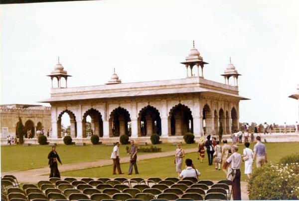Marble Diwan-i-Khas pavilion at the Red Fort, Delhi, visitors strolling on lawn