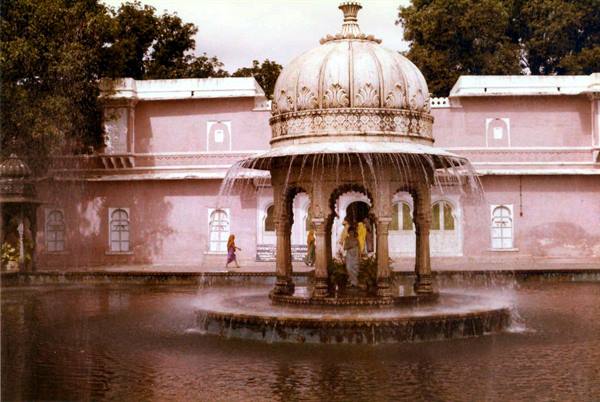 Marble domed pavilion fountain, women in saris, Udaipur