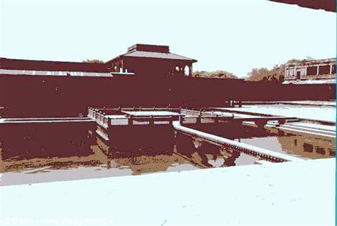 Stone pavilion over a sacred pool at Amritsar Golden Temple