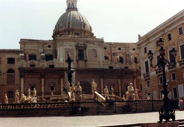 Pretoria Fountain with marble statues in front of San Giuseppe church, Palermo