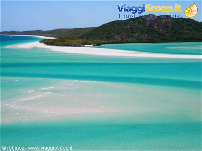 Whitehaven Beach: white sand and turquoise waters under green hills