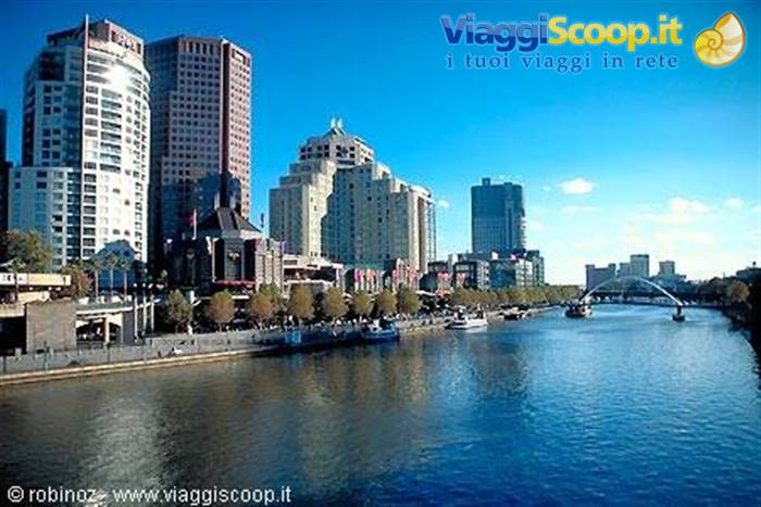 Skyscrapers along Melbourne's Yarra River, footbridge, daylight