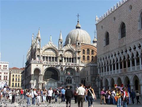 Tourists in St Mark's Square in Venice, Basilica and Doge's Palace