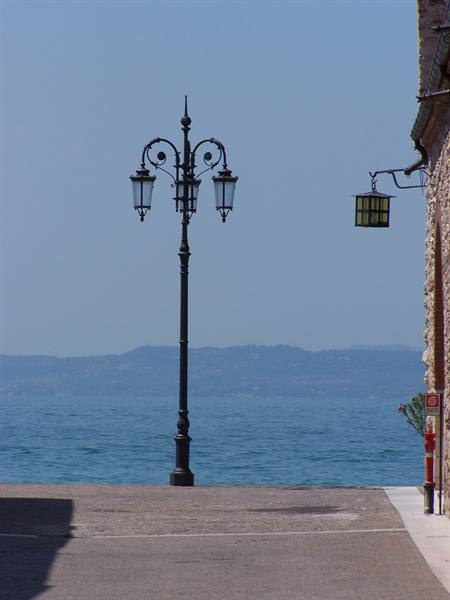 Wrought iron lamp post on the lakeside promenade in Sirmione