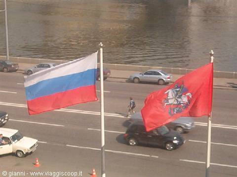 Russian and Moscow flag, with the Moskva in the background