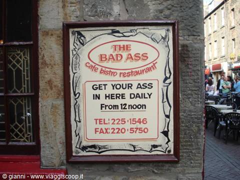 The Bad Ass cafe bistro sign on a stone wall, Edinburgh