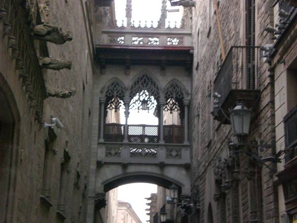 Pont del Bisbe, Gothic stone bridge joining buildings over narrow alley