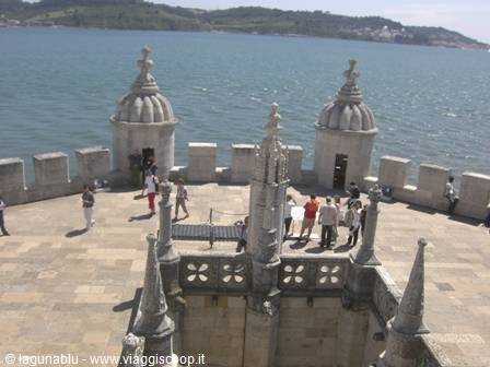 Terrace of Belém Tower in Lisbon, stone battlements over the Tagus River
