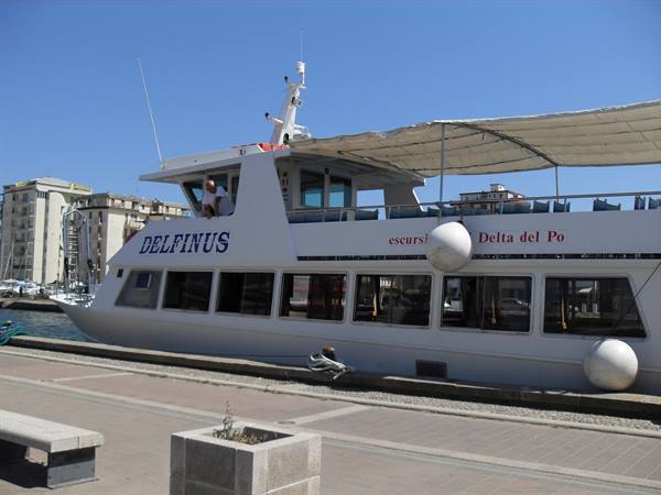 Delfinus excursion boat for Po Delta tours moored at the pier