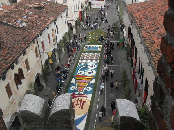 Painted flower carpet along Marostica street, seen from the castle battlements
