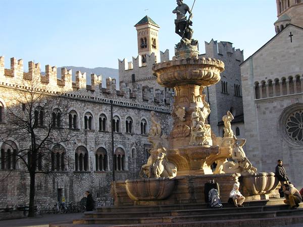 Neptune marble fountain, Piazza Duomo in Trento, afternoon light