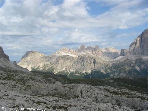 Dolomites: rocky peaks and scree slopes under drifting clouds