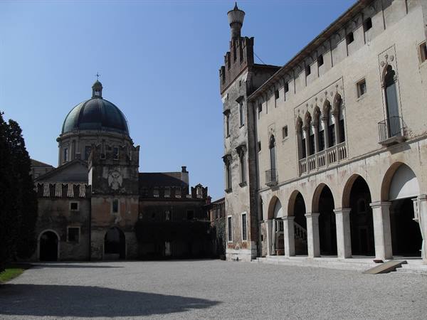 Gravel courtyard of Villa Contarini in Piazzola sul Brenta, arcade and dome in sunlight