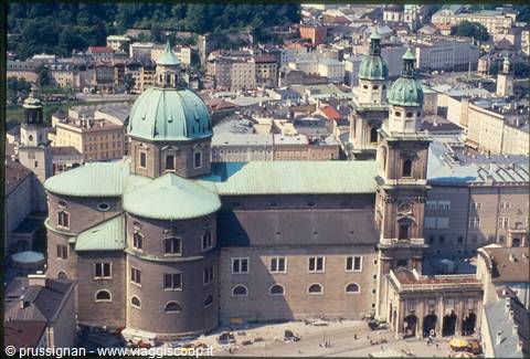 Salzburg Cathedral with green domes seen above the rooftops