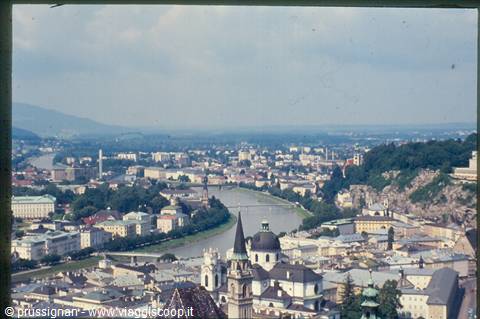 Salzburg: the Salzach river and the green-domed cathedral among rooftops