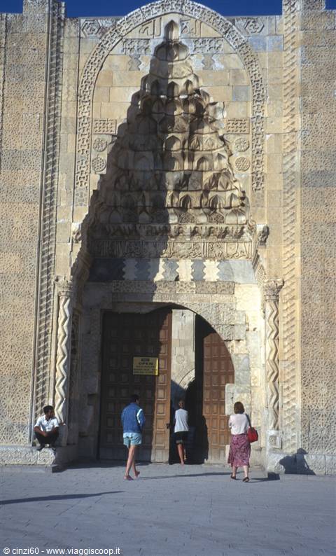 Tourists before the carved portal of the Great Mosque of Divriği, Sivas