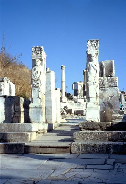 Hercules Gate at Ephesus: marble relief pillars under a blue sky