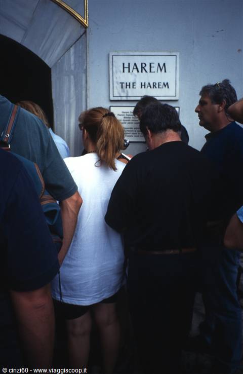 Crowd of tourists gathered in front of the Harem sign, Topkapi, Istanbul