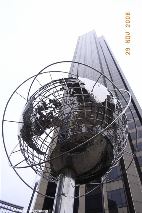 The steel globe in front of Trump Tower, New York, under gray sky