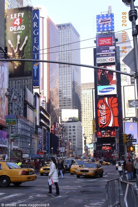 Yellow taxis and bright billboards in Times Square, New York