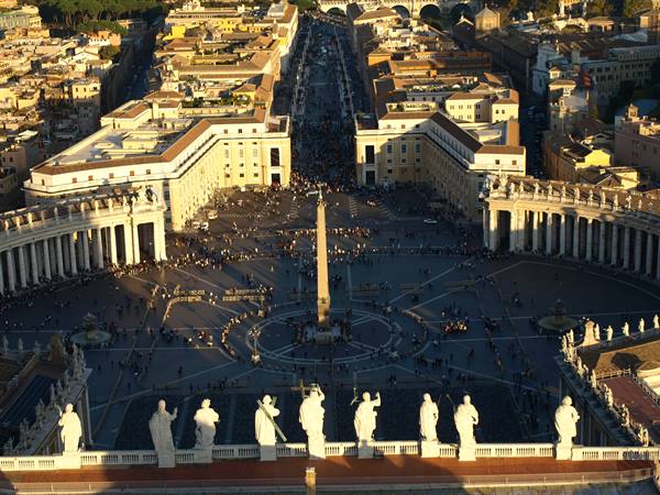 St. Peter's Square seen from above, central obelisk and statues in foreground