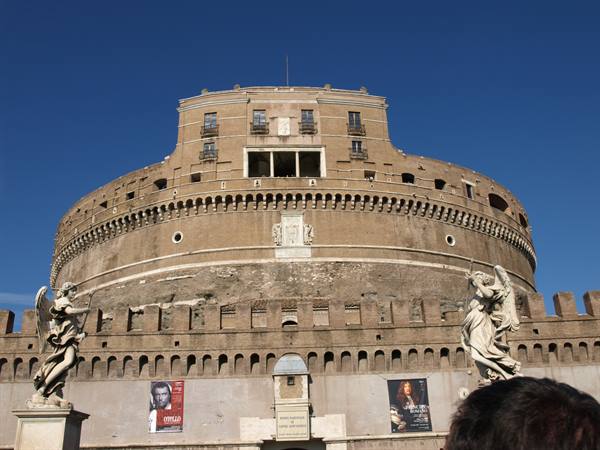 Castel Sant'Angelo in Rome, marble angel statues against clear blue sky