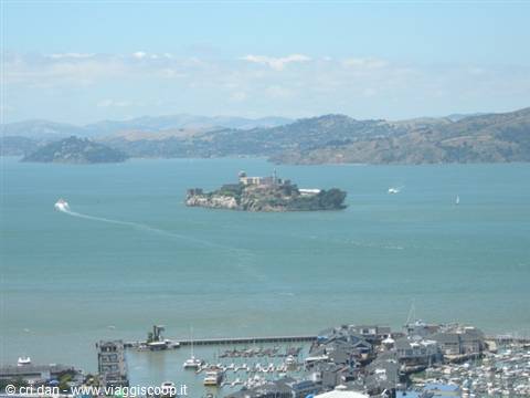 Alcatraz Island in San Francisco Bay, with boats and marina in the foreground
