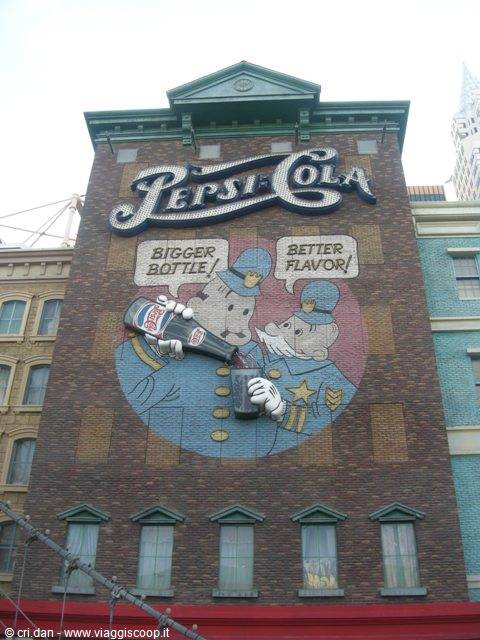 Pepsi-Cola mural with cop on brick facade, New York