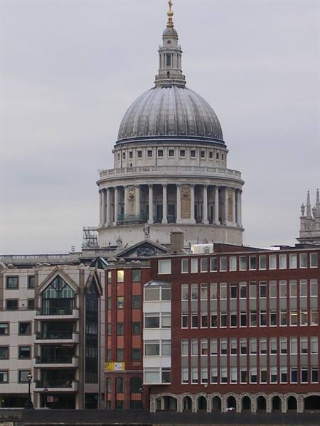 The stone dome of St Paul's Cathedral rising above London buildings