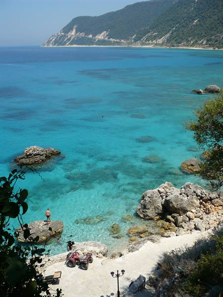 Turquoise water among the rocks, a quad bike by Myrtos beach, Kefalonia