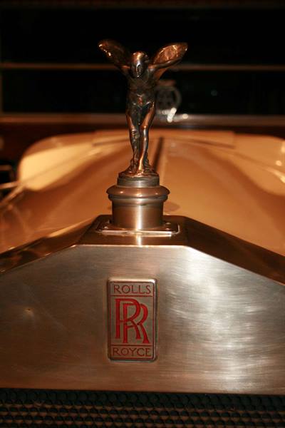 Spirit of Ecstasy metal hood ornament on a Rolls-Royce