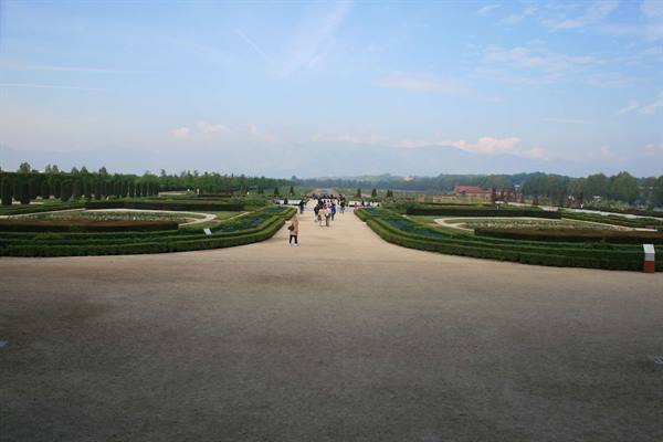 Gravel avenues among clipped hedges in the gardens of Venaria Reale