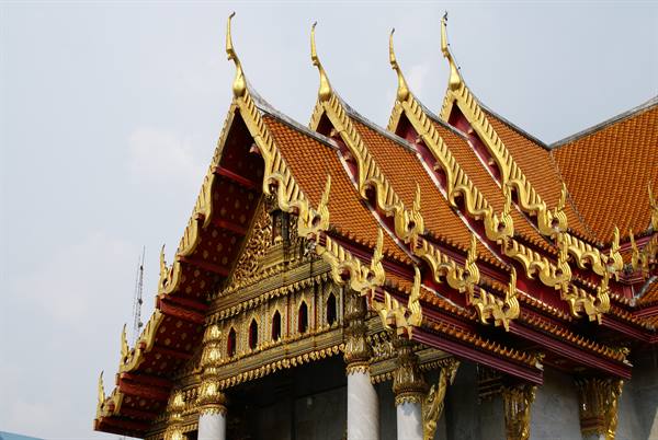 Golden roofs and orange tiles of the Marble Temple in Bangkok