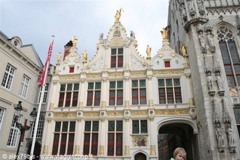 Gilded Renaissance facade with statues on the Burg in Bruges