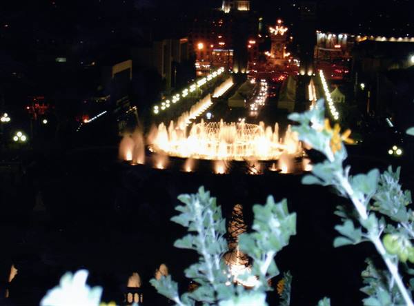 Montjuïc fountain lit at night among illuminated avenues, Barcelona