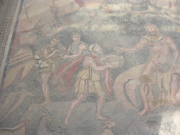 Roman mosaic showing Ulysses offering a wine cup to the Cyclops Polyphemus