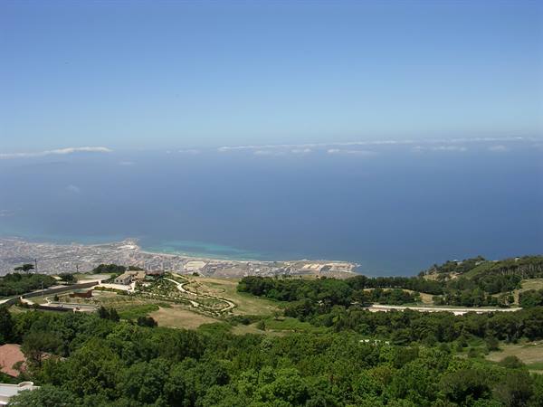 From Erice, the Trapani coastline among greenery and blue sea