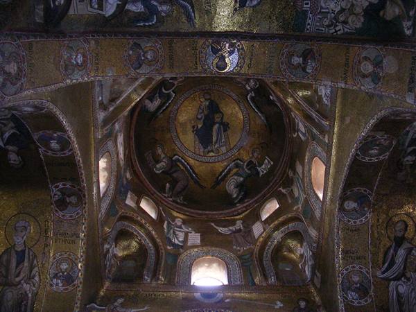 Golden Byzantine mosaics on the dome of Martorana, angels and saints