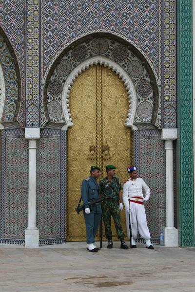 Guards in front of the golden door of the Royal Palace in Rabat