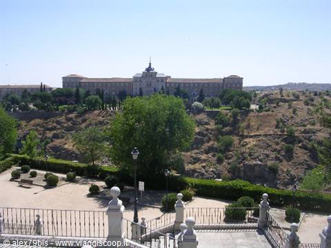 Grand building above the Tagus river, stone ramp and iron gate