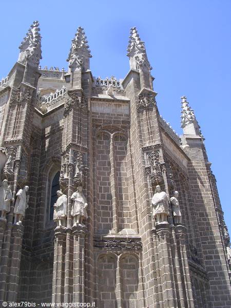 Gothic stone pinnacles and statues on Toledo cathedral facade