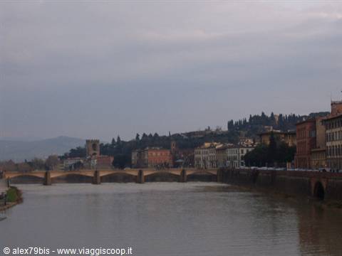 Ponte alle Grazie over the Arno in Florence, grey sky and embankments
