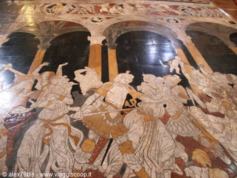Inlaid marble mosaic floor of Siena Cathedral with carved figures