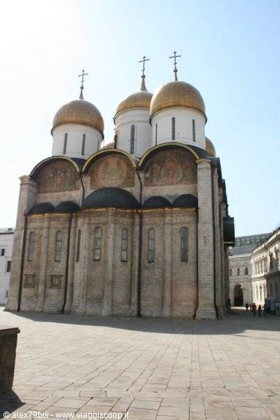 Dormition Cathedral in the Moscow Kremlin, golden domes under the sun