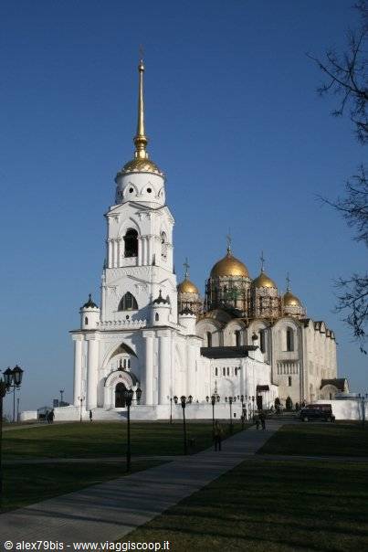 White bell tower and golden domes of the Assumption Cathedral in Vladimir
